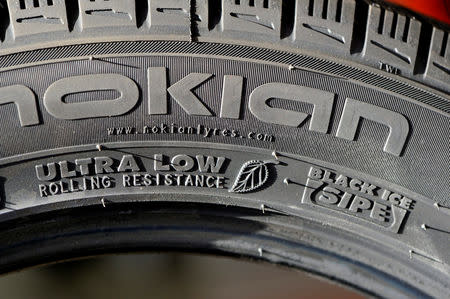 FILE PHOTO: A Nokian Renkaat tyre is pictured in a tyre shop in Hyvinkaa, Finland September 2012. REUTERS/Pekka Sakki/Lehtikuva/File Photo