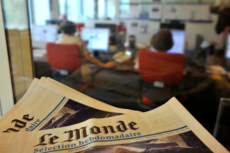 View of an edition of the daily Le Monde in the Le Monde office in Paris