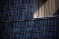 FILE PHOTO: An employee talks on a phone at an office building in Seoul, South Korea, October 2, 2018. REUTERS/Kim Hong-Ji/File Photo