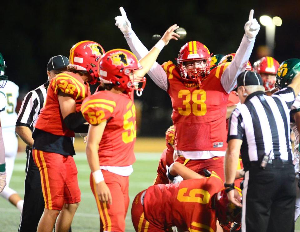 Oakdale defensive lineman Charlie Kjeldgaard (38) celebrates the Oakdale defense recovering a fumble during a game between Oakdale High School and Sonora High School at Oakdale High School in Oakdale California CA on August 18, 2023.