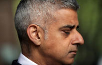 <p>Mayor of London Sadiq Khan closes his eyes as he joins London Ambulance workers in observing a minute’s silence at the London Ambulance Service headquarters at Waterloo, central London, in honour of the London Bridge terror attack victims, Tuesday June 6, 2017. (Photo: Yui Mok/PA via AP) </p>