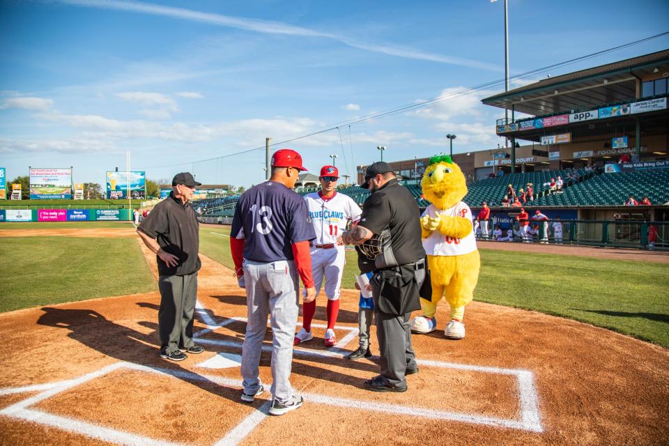 Jersey Shore BlueClaws manager Greg Brodzinski (11) during the pregame meeting at home plate prior to Tuesday night's exhibition game against Reading at FirstEnergy Park in Lakewood.