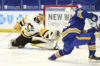 Buffalo Sabres forward Arttu Ruotsalainen (25) puts the puck past Pittsburgh Penguins goalie Casey DeSmith (1) during the first period of an NHL hockey game, Sunday, April 18, 2021, in Buffalo, N.Y. (AP Photo/Jeffrey T. Barnes)