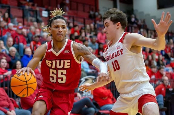 Bradley University guard Connor Hickman covers SIU-E guard Lamar Wright during the Braves 56-54 win at First Community Arena in Edwardsville on Tuesday, Dec. 6, 2022.