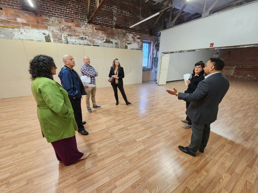 City of Moline officials met recently with Ballet Quad Cities CEO Joedy Cook (right) to discuss the planned renovation of 1611 5th Ave., Moline, for the professional dance company.