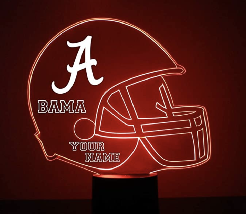 Football with Alabama logo and YOUR NAME written out.