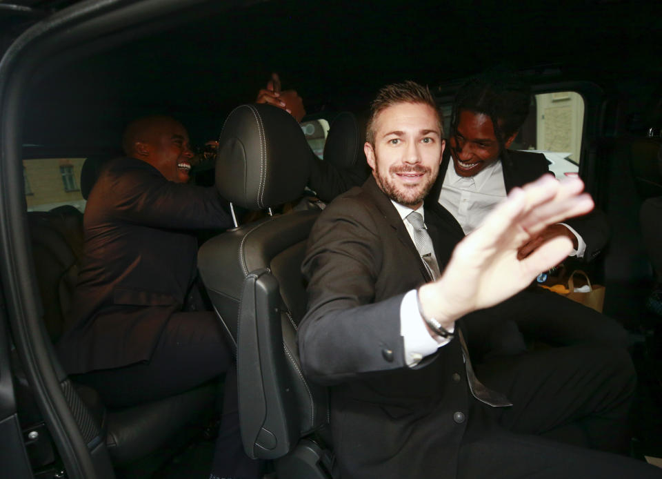 A$AP Rocky, right, leaves the district court after the third day of his trial in Stockholm, Friday, Aug. 2, 2019. A Swedish court has ruled that American rapper A$AP Rocky and two other U.S. suspects can be freed from detention until Aug. 14, when the verdict on their assault case will be announced. Prosecutor Daniel Suneson said in his closing comments that he was seeking a six-month sentence for the rapper. (Fredrik Persson/TT News Agency via AP)