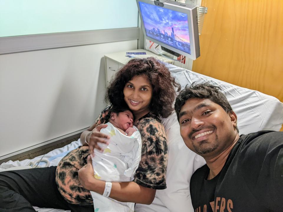 Mrs Bandara with her husband and newborn baby son in the hospital. 