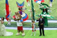 <p>Zabivaka the FIFA World Cup Russia mascot and Brazil legend Ronaldo wave to the crowd during the opening ceremony. (Getty) </p>