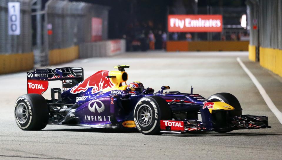 Red Bull Formula One driver Mark Webber of Australia drives during the qualifying session of the Singapore F1 Grand Prix at the Marina Bay street circuit in Singapore September 21, 2013. REUTERS/Natashia Lee (SINGAPORE - Tags: SPORT MOTORSPORT F1)