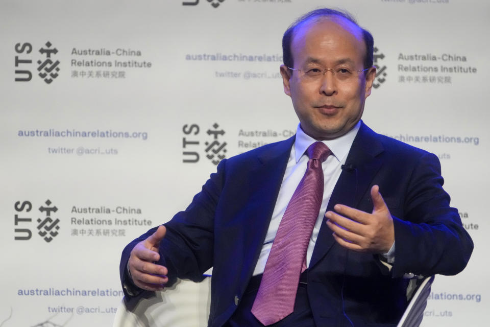 China's Ambassador to Australia, Xiao Qian gestures as he answers following his address on the state of relations between Australia and China at the University of Technology in Sydney, Australia, Friday, June 24, 2022.(AP Photo/Mark Baker)