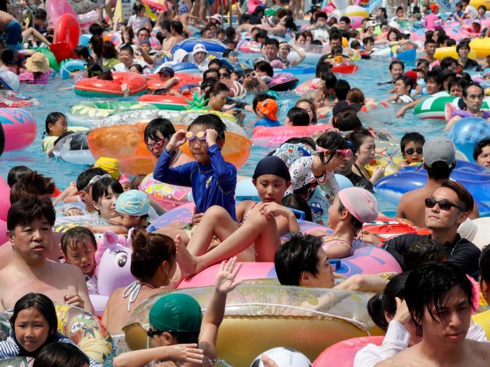 A pool in Tokyo's Toshimaen amusement park; the Japanese capital recorded a high of 36.3 C on 16 July (EPA)
