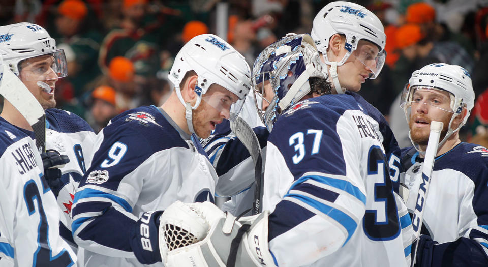 Connor Hellebuyck has carried the Jets with his strong play. (Bruce Kluckhohn/Getty)