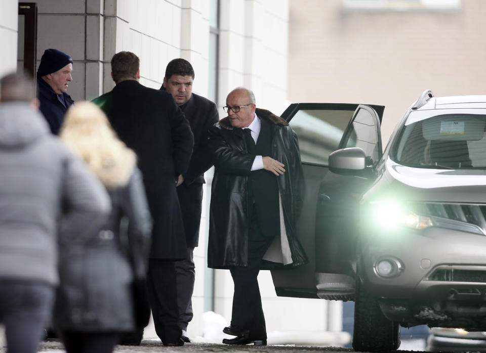 People gather at the funeral home during the visitation for Vito Rizzuto, head of the infamous Rizzuto crime family, in Montreal December 29, 2013. Rizzuto died of natural causes in a hospital on December 23, 2013. REUTERS/Christinne Muschi (CANADA - Tags: CRIME LAW OBITUARY SOCIETY)