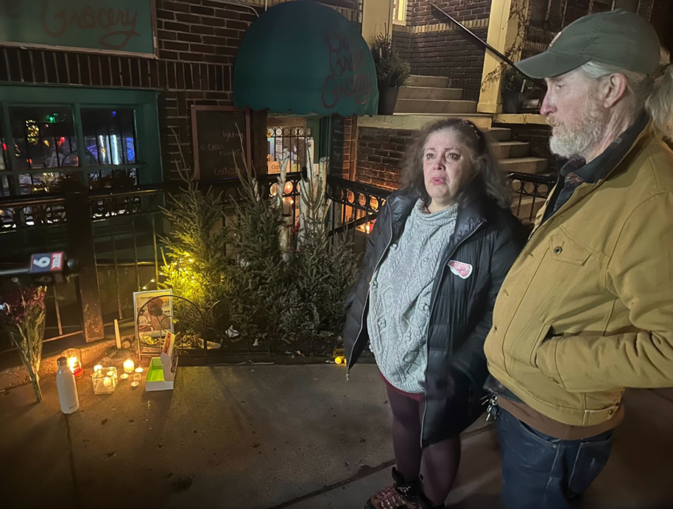 Neighbours gathered at a memorial for Robert Skafte on Saturday (Louis Krauss/ Minneapolis Star Tribune)