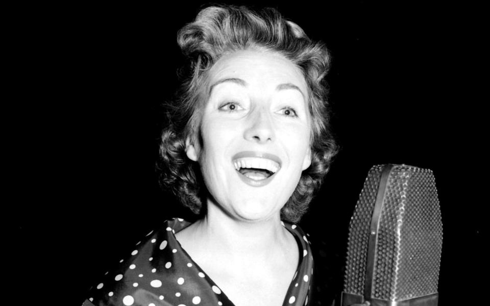 Dame Vera rehearsing in London for her radio show in 1956 - PA