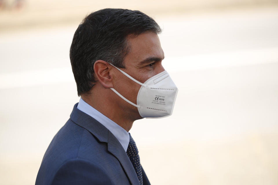 Spain's Prime Minister Pedro Sanchez arrives for an EU summit at the Alfandega do Porto Congress Center in Porto, Portugal, Friday, May 7, 2021. European Union leaders are meeting for a summit in Portugal on Friday, sending a signal they see the threat from COVID-19 on their continent as waning amid a quickening vaccine rollout. Their talks hope to repair some of the damage the coronavirus has caused in the bloc, in such areas as welfare and employment. (AP Photo/Francisco Seco, Pool)