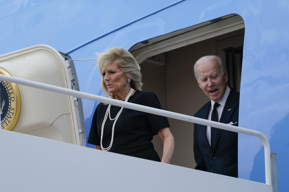 President Joe Biden and first lady Jill Biden walk down the steps of Air Force One at Andrews Air Force Base, Md., Monday, Sept. 19, 2022, as they return from a trip to London to attend the funeral for Queen Elizabeth II. (AP Photo/Susan Walsh)