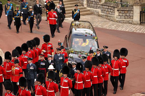 WINDSOR, ENGLAND - SEPTEMBER 19: The Royal State Hearse carrying the coffin of Queen Elizabeth II arrives at Windsor Castle for the Committal Service for Queen Elizabeth II on September 19, 2022 in Windsor, England. The committal service at St George's Chapel, Windsor Castle, took place following the state funeral at Westminster Abbey. A private burial in The King George VI Memorial Chapel followed. Queen Elizabeth II died at Balmoral Castle in Scotland on September 8, 2022, and is succeeded by her eldest son, King Charles III. (Photo by Ryan Pierse/Getty Images)