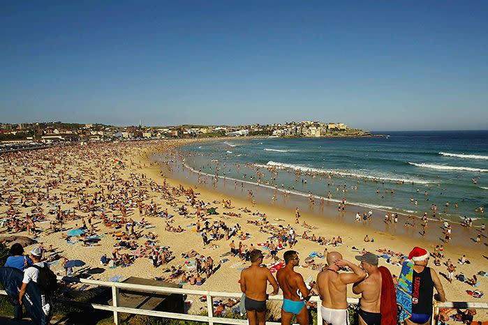 Thousands of Aussies enjoying Christmas at the beach. Image: Getty