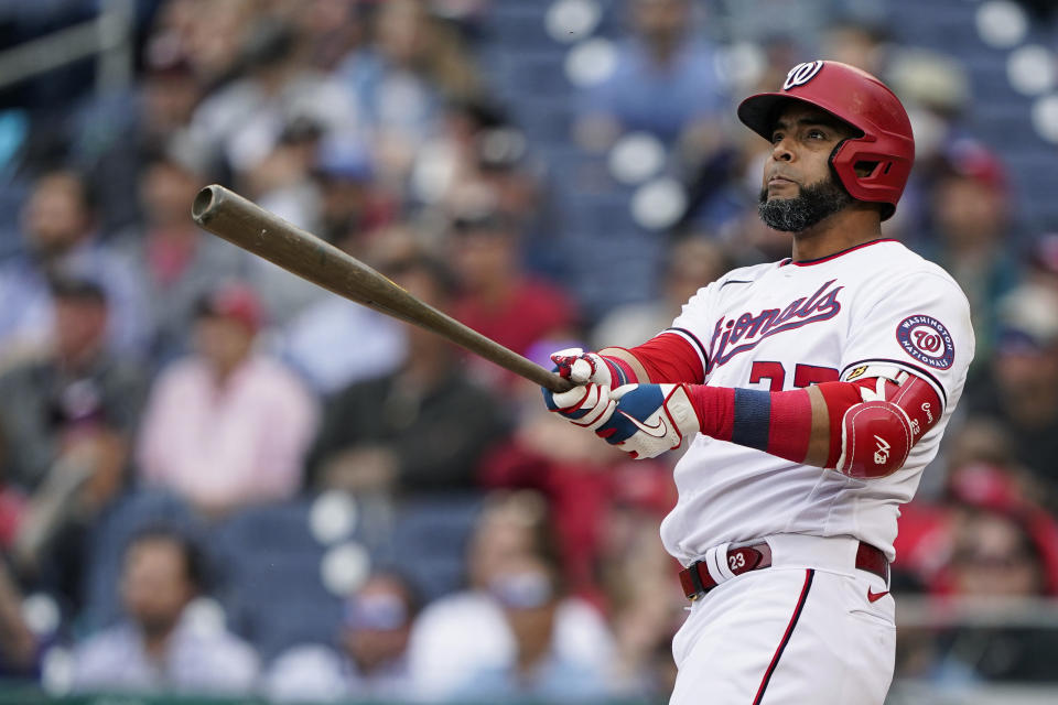 FILE - Washington Nationals' Nelson Cruz watches his two-run home run during the fourth inning of a baseball game against the Arizona Diamondbacks at Nationals Park, April 21, 2022, in Washington. Cruz, a seven-time All-Star and 19-year Major League Baseball veteran, says he is retiring after 19 seasons. Cruz, who is 43, said on Adam Jones' podcast Friday, Nov. 2, 2023, that he plans to play this winter in the Dominican Professional Baseball League. (AP Photo/Alex Brandon, File)