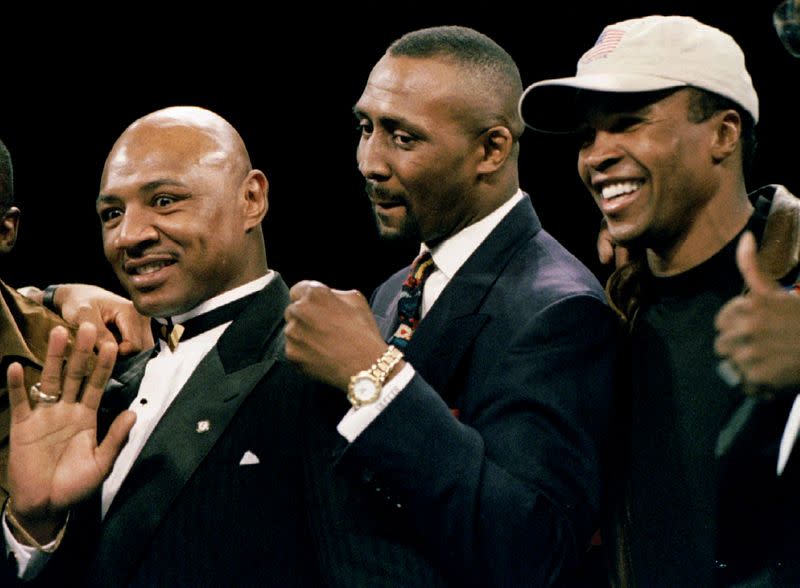 FILE PHOTO: Former boxing greats (L-R) Marvelous Marvin Hagler, Thomas "Hit Man" Hearns and Sugar Ray Leonard po..
