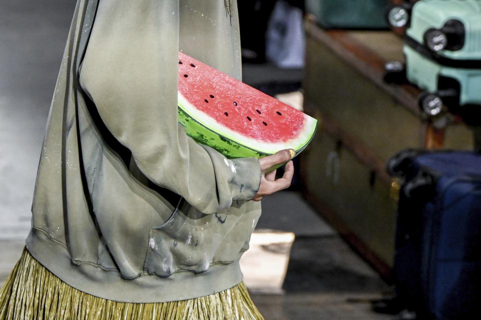 A model wears a creation as part of the Moschino Spring Summer 2025 collection, that was presented in Milan, Italy, Friday, June 14, 2024. (AP Photo/Nicola Marfisi).