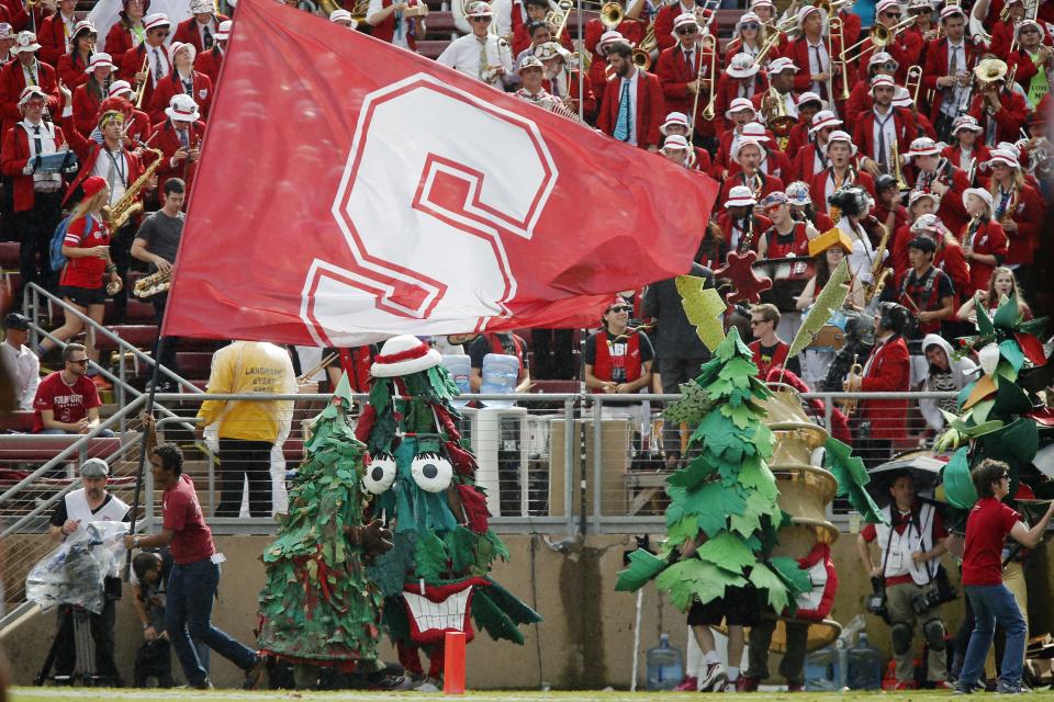 PALO ALTO, CA - OCTOBER 25:  The Stanford band, the Stanford trees, and fans cheer on the Stanford Cardinal after a touchdown against the Oregon State Beavers in the first quarter on October 25, 2014 at Stanford Stadium in Palo Alto, California.  Stanford won 38-14.  (Photo by Brian Bahr/Getty Images)