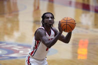 Detroit Mercy guard Antoine Davis shoots a free-throw during an NCAA college basketball game against Youngstown State, Thursday, Jan. 12, 2023, in Detroit. Davis, the nation's leading scorer, made a personal-best 11 3-pointers in a win over Robert Morris on Jan. 14, giving him 513 in a career few saw coming when he stepped on campus. (AP Photo/Carlos Osorio)