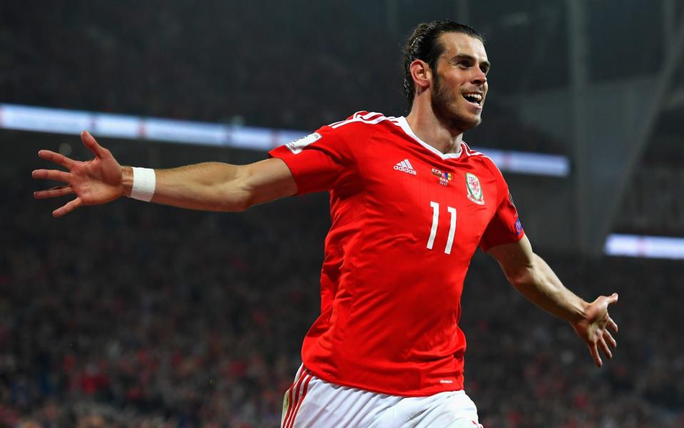 Gareth Bale of Wales celebrates scoring his sides third goal during the 2018 FIFA World Cup Qualifier Group D match between Wales and Moldova at Cardiff City Stadium on September 5, 2016 in Cardiff, Wale - Stu Forster 