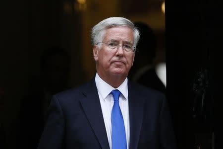 Britain's Secretary of State for Defence Michael Fallon leaves after attending a cabinet meeting at Number 10 Downing Street in London, Britain September 8, 2015. REUTERS/Stefan Wermuth