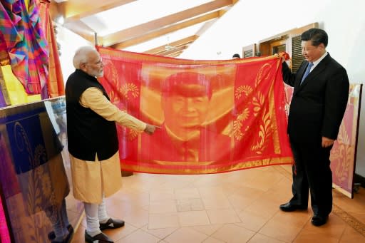 Xi and Modi exchanged gifts at their summit where the Chinese president said they had "candid discussions as friends"