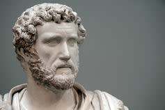 <span class="caption">A statue head of Antoninus Pius (138-161AD) at Cyrene dating from about 140 AD.</span> <span class="attribution"><a class="link " href="http://www.shutterstock.com/pic-426162010/stock-photo-london-uk-february-27-2011-statue-head-dating-from-about-ad140-from-cyrene-north-africa-of-antoninus-pius-138-161ad.html?src=zYVj_3K_LGyO2q48AKcQuw-1-13" rel="nofollow noopener" target="_blank" data-ylk="slk:Tony Baggett/Shutterstock;elm:context_link;itc:0;sec:content-canvas">Tony Baggett/Shutterstock</a></span>