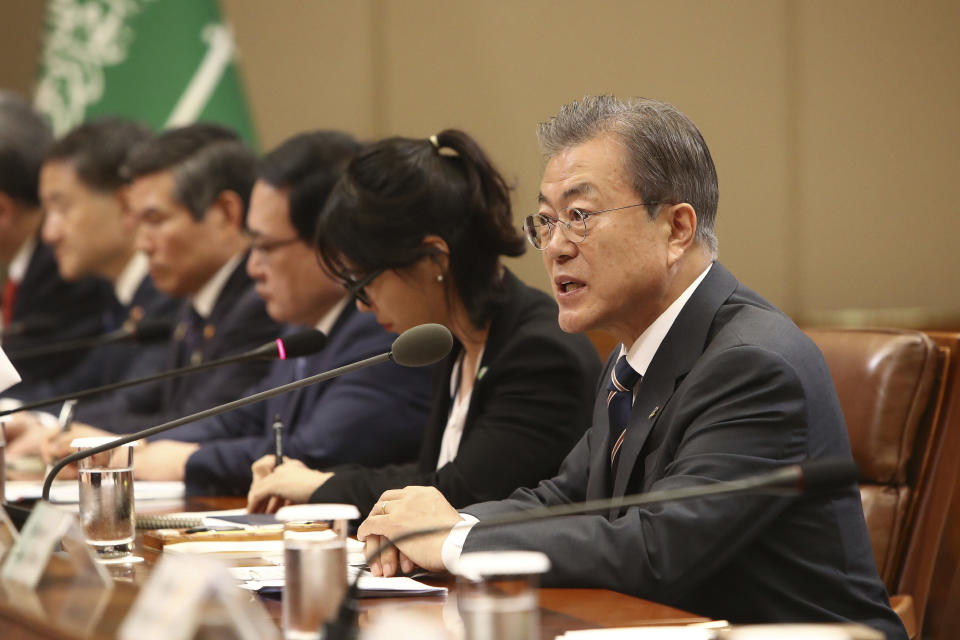 South Korean President Moon Jae-in, right, talks with Saudi Crown Prince Mohammed bin Salman, not pictured, at the presidential Blue House, Wednesday, June 26, 2019, in Seoul, South Korea. Bin Salman is visiting South Korea for two days - the first time by an heir to the throne of Saudi Arabia since 1998. (Chung Sung-Jun/Pool Photo via AP)