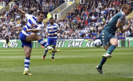 Britain Football Soccer - Reading v Wigan Athletic - Sky Bet Championship - The Madejski Stadium - 29/4/17 Reading's Yann Kermorgant has his shot blocked by Wigan Athletics Dan Burn Mandatory Credit: Action Images / Adam Holt Livepic