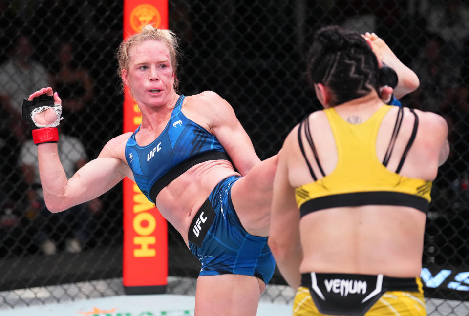 LAS VEGAS, NEVADA – MAY 21: (L-R) Holly Holm kicks Ketlen Vieira of <a class="link " href="https://sports.yahoo.com/soccer/teams/brazil-women/" data-i13n="sec:content-canvas;subsec:anchor_text;elm:context_link" data-ylk="slk:Brazil;sec:content-canvas;subsec:anchor_text;elm:context_link;itc:0">Brazil</a> in a bantamweight bout during the UFC Fight Night event at UFC APEX on May 21, 2022 in Las Vegas, Nevada. (Photo by Chris Unger/Zuffa LLC)