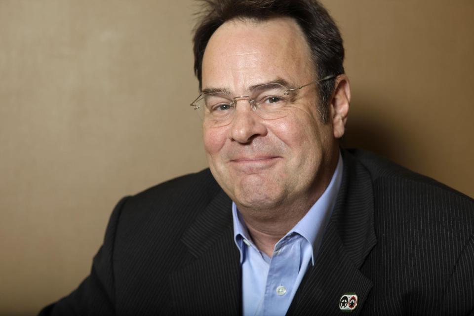 FILE - In this Dec. 4, 2010 file photo, Dan Aykroyd poses for a photo in Los Angeles. Fancy having Brad Pitt and Angelina Jolie, Drew Barrymore and Aykroyd over for dinner? You might start with an aperitif of Jolie and Pitt's new Miraval rose, move on to a light pasta dish served with Barrymore Wine's pinot grigio, then perhaps finish up with a glass of Canadian Aykroyd's cabernet franc ice wine for dessert. (AP Photo/Sarah Hummert, File)