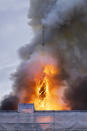 Fire and smoke rise out of the Old Stock Exchange, Boersen, in Copenhagen, Denmark, Tuesday, April 16, 2024. One of Copenhagen’s oldest buildings is on fire and its iconic spire has collapsed. The copper roof of the 17th-century Old Stock Exchange, or Boersen, that was once Denmark’s financial center, was engulfed in flames Tuesday. (Ida Marie Odgaard/Ritzau Scanpix via AP)