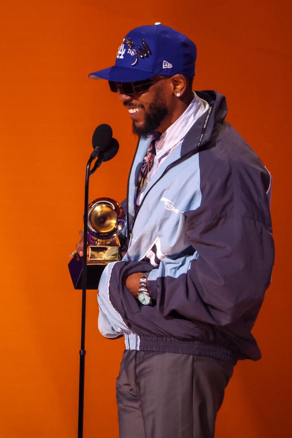 Kendrick Lamar accepts the award for rap album at the 65th Grammy Awards.