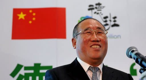 Xie Zhenhua, Vice Chairman of the National Development and Reform Commission of China and head of the Chinese delegation, speaks during the opening of China's stand at the UN Climate Change Conference in Durban on December 4