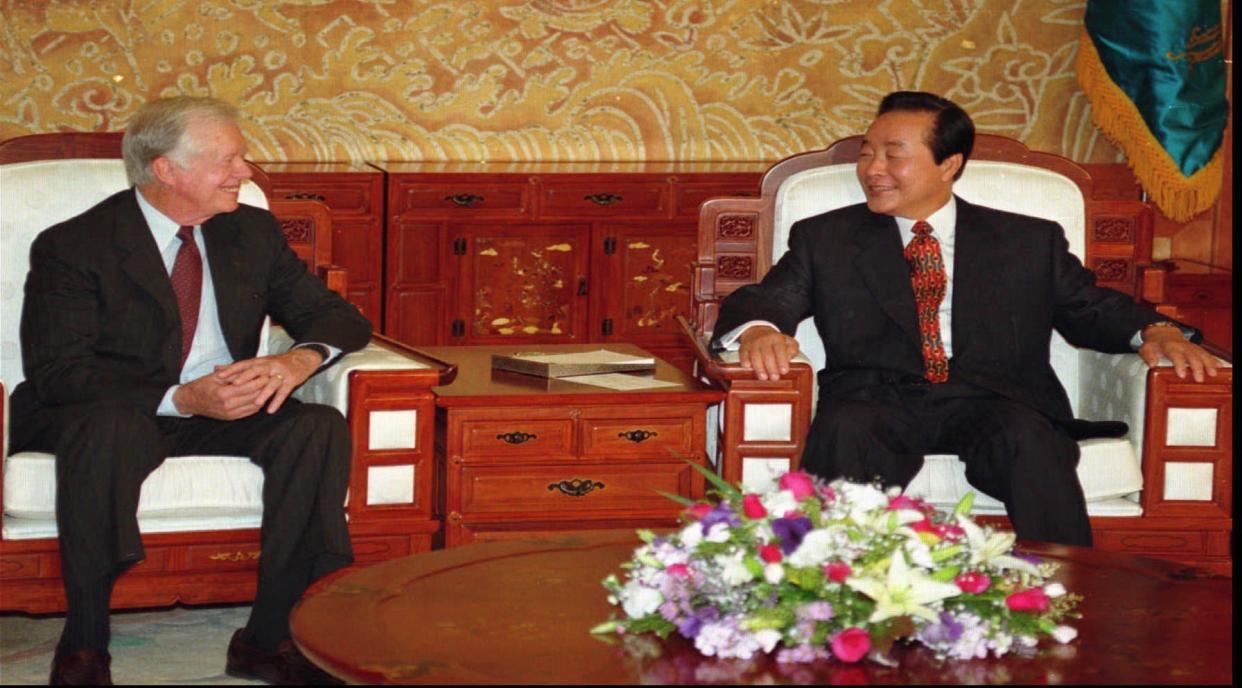 Former President Jimmy Carter, left, talks with South Korean President Kim Young-sam at the presidential palace on June 14, 1994, in Seoul. Carter will leave for North Korea on June 15, to try to help resolve the nuclear dispute during his four-day stay in North Korea. North Korea announced on June 13 it would withdraw its membership from the International Atomic Energy Agency making it virtually impossible to check whether North Korea is complying with an international nuclear arms-control pact it signed in 1985. South Korea and Japan voiced dismay over the North's decision and appealed to the hard-line state to reconsider.