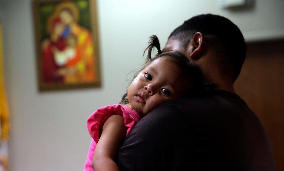 migrant child family reunited