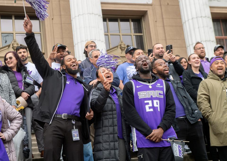 More than 100 Stockton Kings fans cheer as they gather on the steps of City Hall in downtown Stockton on Tuesday, Mar. 28, 2023 for a rally in honor of the Kings securing a berth in the NBA G League playoffs.