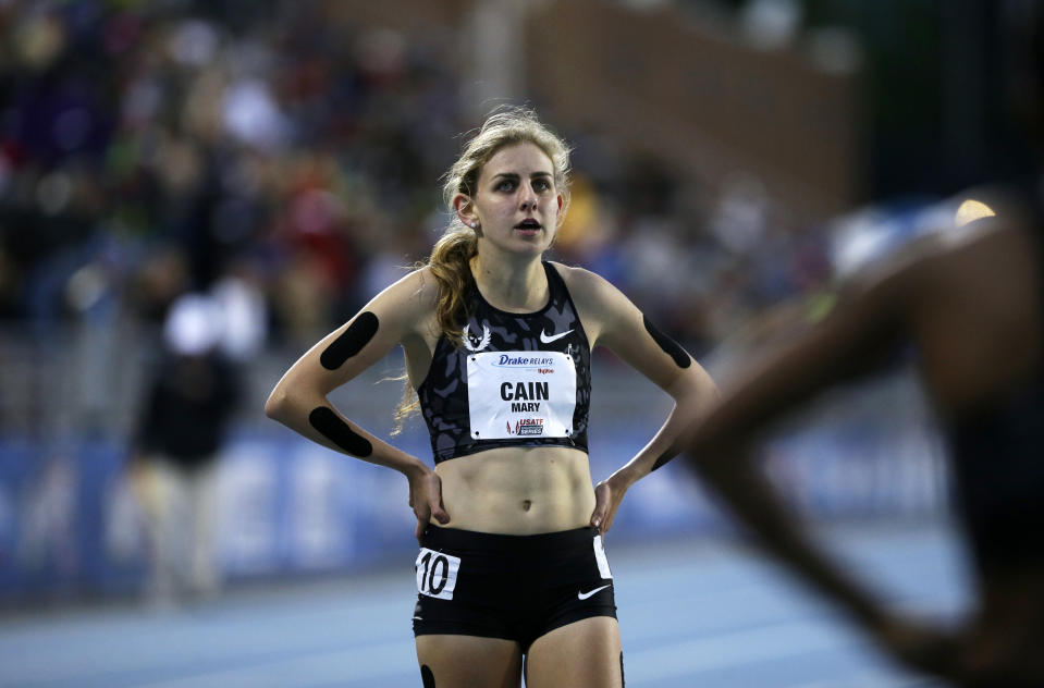 FILE - In this April 29, 2016, file photo, Mary Cain walks off the track after competing in the women's special 1500-meter run at the Drake Relays athletics meet, in Des Moines, Iowa. Nike will investigate allegations of abuse by runner Mary Cain while she was a member of Alberto Salazar's training group. Cain joined the disbanded Nike Oregon Project run by Salazar in 2013, soon after competing in the 1,500-meter final at track and field's world championships when she was 17. (AP Photo/Charlie Neibergall, File)