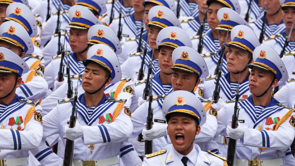 Members of an honor guard stand in formation during the welcome ceremony for Russia's President Vladimir Putin hosted by Vietnam's President To Lam on June 20, 2024. - Athit Perawongmetha/Reuters