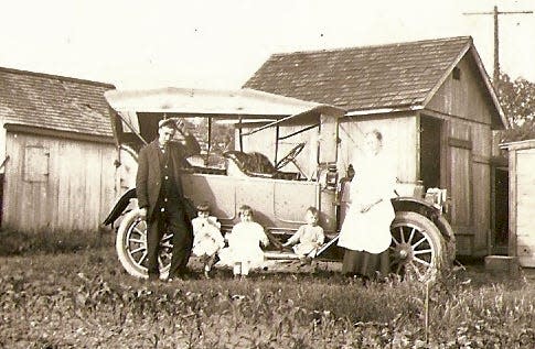 Standing next to their Studebaker are Elmer and Issie Trittipo and their children Juanita, Genevieve and Walt, residents of South Bend's southside. Their son Herschel Trittipo and Juanita's husband, Clyde Eckenberger, later worked in the Studebaker factory. This photo was probably taken around 1917.