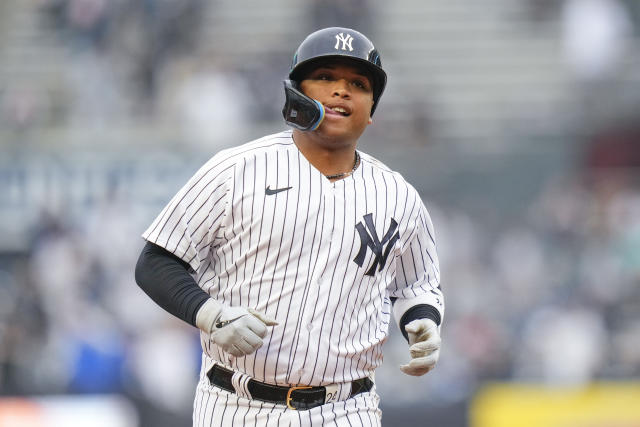 New York Yankees' Gleyber Torres, right, celebrates with teammate Willie  Calhoun after they scored on a two-run home run during the fourth inning in  the second baseball game of a doubleheader against