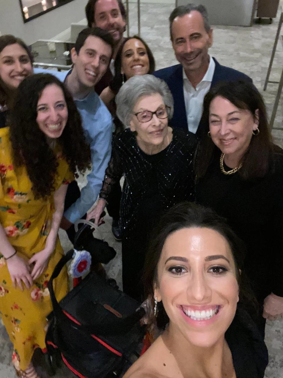 Lily Aaronson (center) with her two children, including her son Geoffrey (top right) and her grandchildren at her granddaughter’s wedding on Feb. 29, 2020, at the Eden Roc hotel in Miami Beach.