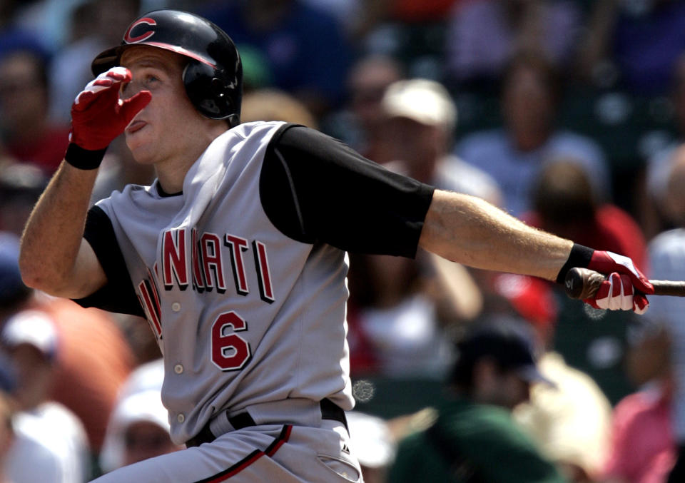 Cincinnati Reds' Ryan Freel watches after hittting a solo home run off  Chicago Cubs starting pitcher Rich Hill  in the first inning at Wrigley Field, Wednesday, Aug. 10, 2005 in Chicago.(AP Photo/Nam Y. Huh)