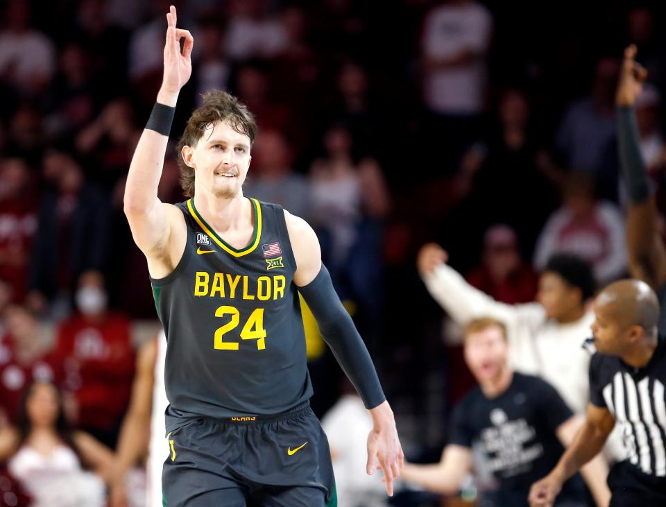 Matthew Mayer celebrates a successful 3-pointer during Baylor’s victory at Oklahoma in January.